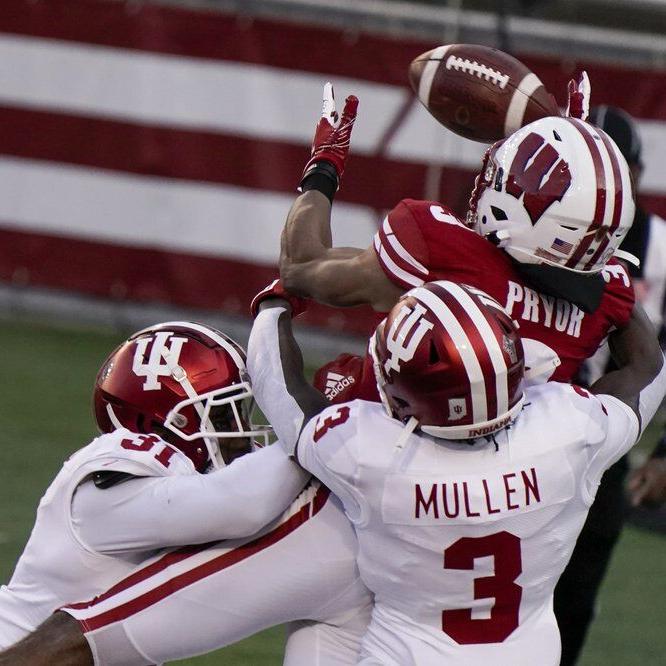 Indiana defensive back Tiawan Mullen (3)and defensive back Bryant Fitzgerald (31) break up a pass